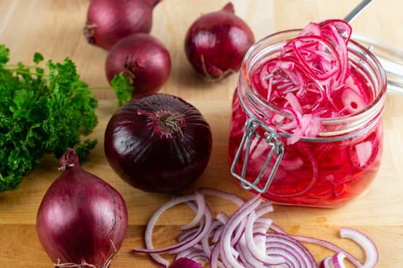 Overhead photo of pickled red onions